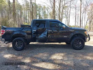 2011 Ford F-150 XLT with VIN 1FTFW1ET8BFA70797, listed as a IAAI auction lot 41909232 with 118,843 mi miles. Bid and sale history available at carsss.com. Image 13.