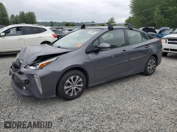 2020 Toyota Prius LE z VIN JTDL9RFU6L3021262, wystawiony jako Copart lot #60809845 z przebiegiem 83 870 mil mil oraz Szkoda całkowita • Salvage title. Historia ofert i sprzedaży dostępna na DreamBid. Obrazek 1.