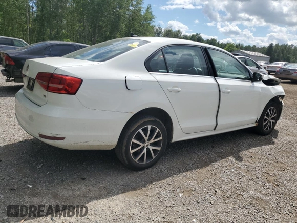 2015 Volkswagen Jetta SE z VIN 3VWD07AJ1FM234054, wystawiony jako Copart lot #63195905 z przebiegiem 425 199 mil mil oraz Czysty tytuł • Clean title. Historia ofert i sprzedaży dostępna na DreamBid. Obrazek 3.