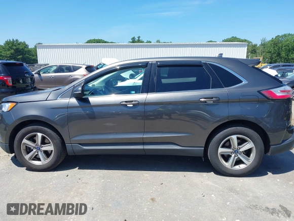 2019 Ford Edge SEL with VIN 2FMPK4J91KBC13436, listed as a IAAI auction lot 42551782 with 77,164 mi miles and . Bid and sale history available at DreamBid. Image 14.