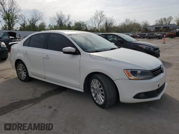 2013 Volkswagen Jetta TDI w/Premium/Nav with VIN 3VWLL7AJ4DM242682, listed as a Copart auction lot 53879635 with 123,945 mi miles and Salvage title. Bid and sale history available at DreamBid. Image 4.