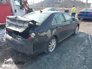 2014 Toyota Camry SE with VIN 4T1BK1FK3EU537670, listed as a IAAI auction lot 41649097 with 64,636 mi miles. Bid and sale history available at carsss.com. Image 4.