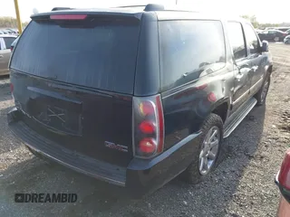 2011 GMC Yukon XL Denali with VIN 1GKS1MEF7BR271098, listed as a IAAI auction lot 42064073 with 218,601 mi miles. Bid and sale history available at carsss.com. Image 4.