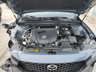 2023 Mazda CX-50 S Premium Plus with VIN 7MMVABEM7PN101642, listed as a Copart auction lot 47498675 with 12,299 mi miles and Salvage Title. Bid and sale history available at DreamBid. Image 12.