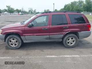 2000 Jeep Grand Cherokee Laredo z VIN 1J4GW48S2YC288439, wystawiony jako IAAI lot #42492798 z przebiegiem 272 527 mil mil oraz . Historia ofert i sprzedaży dostępna na DreamBid. Obrazek 6.