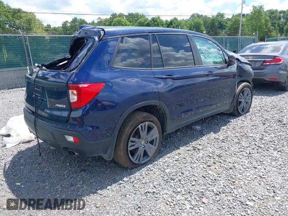 2021 Honda Passport EX-L with VIN 5FNYF8H51MB020250, listed as a IAAI auction lot 40009629 with 54,239 mi miles and . Bid and sale history available at DreamBid. Image 4.