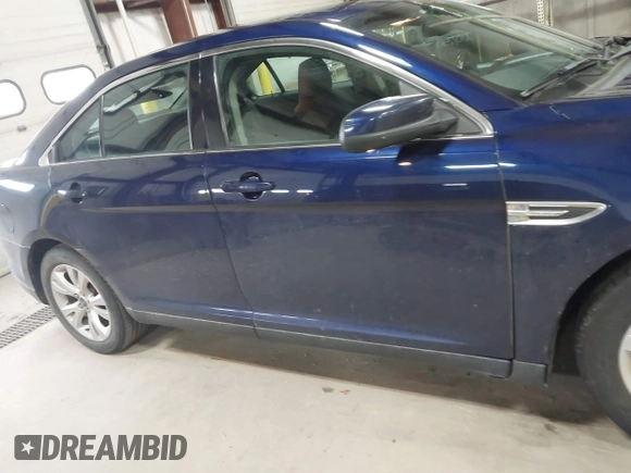 2011 Ford Taurus SEL with VIN 1FAHP2EW7BG174493, listed as a IAAI auction lot 41697856 with 143,957 mi miles. Bid and sale history available at carsss.com. Image 13.