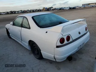 1995 Nissan Skyline z VIN ECR33060119, wystawiony jako Copart lot #76521404 z przebiegiem 134 480 mil mil oraz Szkoda całkowita • Salvage title. Historia ofert i sprzedaży dostępna na DreamBid. Obrazek 2.
