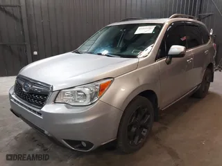2015 Subaru Forester 2.5i Touring with VIN JF2SJAUC8FH468456, listed as a IAAI auction lot 41132284 with 188,408 mi miles. Bid and sale history available at carsss.com. Image 2.