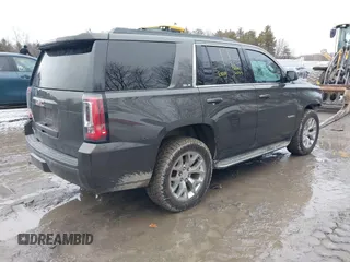 2019 GMC Yukon SLE with VIN 1GKS2AKC1KR385085, listed as a IAAI auction lot 41699370 with 83,889 mi miles. Bid and sale history available at carsss.com. Image 4.