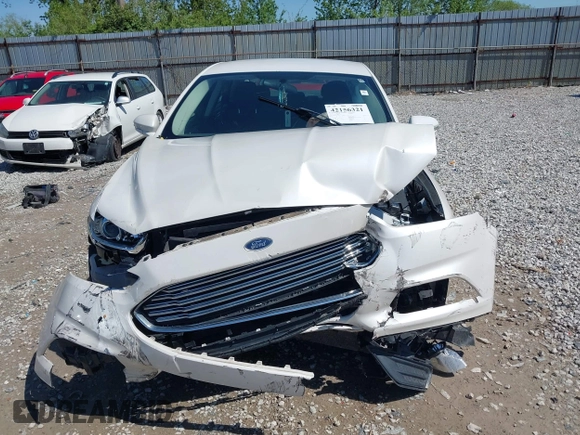 2013 Ford Fusion SE Hybrid z VIN 3FA6P0LU9DR349321, wystawiony jako IAAI lot #42156321 z przebiegiem 90 688 mil mil oraz . Historia ofert i sprzedaży dostępna na DreamBid. Obrazek 12.