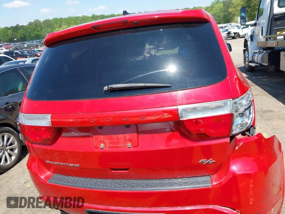 2013 Dodge Durango R/T with VIN 1C4SDJCT0DC686103, listed as a IAAI auction lot 41985034 with 117,212 mi miles and . Bid and sale history available at DreamBid. Image 16.