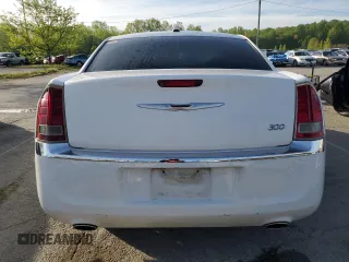 2012 Chrysler 300 Limited with VIN 2C3CCACGXCH216512, listed as a Copart auction lot 54104655 with 228,538 mi miles and Clean Title. Bid and sale history available at DreamBid. Image 6.