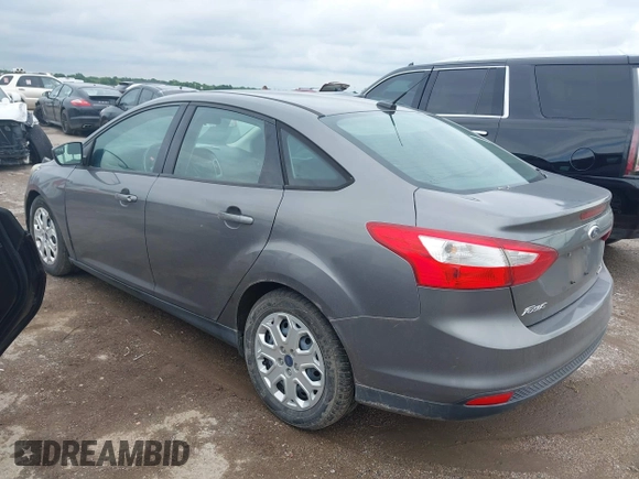 2012 Ford Focus SE z VIN 1FAHP3F2XCL430734, wystawiony jako IAAI lot #42469084 z przebiegiem 128 168 mil mil oraz . Historia ofert i sprzedaży dostępna na DreamBid. Obrazek 3.