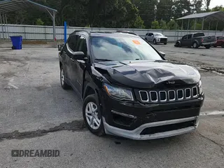 2019 Jeep Compass Sport z VIN 3C4NJCAB8KT615860, wystawiony jako Copart lot #60784545 z przebiegiem 109 592 mil mil oraz Szkoda całkowita • Salvage title. Historia ofert i sprzedaży dostępna na DreamBid. Obrazek 14.