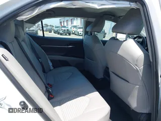 2023 Toyota Camry SE with VIN 4T1G11AK0PU736081, listed as a IAAI auction lot 42090419 with 32,303 mi miles and . Bid and sale history available at DreamBid. Image 8.