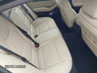 2020 Cadillac CT5 Premium Luxury with VIN 1G6DT5RK7L0141035, listed as a IAAI auction lot 41849703 with 52,712 mi miles and . Bid and sale history available at DreamBid. Image 8.