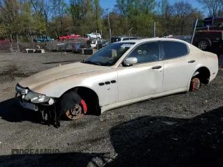 2007 Maserati Quattroporte z VIN ZAMCE39A570027583, wystawiony jako Copart lot #53634695 z przebiegiem Nie podano mil oraz Szkoda całkowita • Salvage title. Historia ofert i sprzedaży dostępna na DreamBid. Obrazek 1.