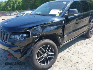 2017 Jeep Grand Cherokee Trailhawk with VIN 1C4RJFLG4HC940652, listed as a IAAI auction lot 42135489 with 102,593 mi miles and . Bid and sale history available at DreamBid. Image 6.