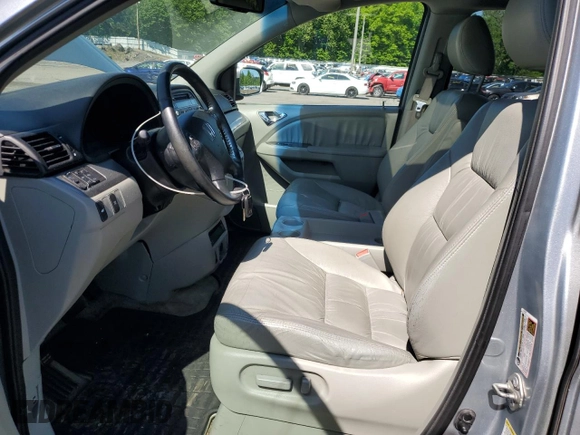 2010 Honda Odyssey EX-L с VIN 5FNRL3H75AB054835, выставлен на аукционе Copart как лот 56779865 с пробегом 121 546 миль миль и Чистый • Clean title. История ставок и продаж доступна на DreamBid. Изображение 7.