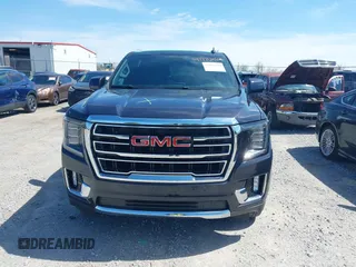 2023 GMC Yukon XL SLT z VIN 1GKS2GKD1PR137714, wystawiony jako IAAI lot #41982459 z przebiegiem 63 887 mil mil oraz . Historia ofert i sprzedaży dostępna na DreamBid. Obrazek 12.