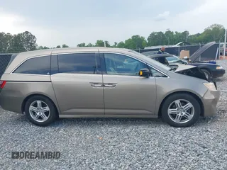 2011 Honda Odyssey Touring с VIN 5FNRL5H98BB095796, выставлен на аукционе IAAI как лот 42094695 с пробегом 158 410 миль миль и . История ставок и продаж доступна на DreamBid. Изображение 14.