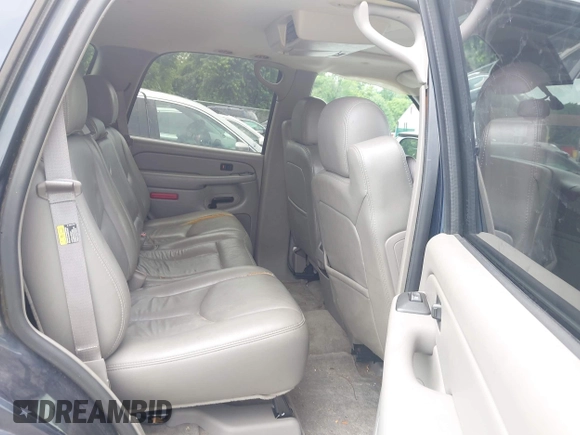 2005 Chevrolet Tahoe LT with VIN 1GNEK13T15J169979, listed as a IAAI auction lot 42718037 with 241,404 mi miles and . Bid and sale history available at DreamBid. Image 8.