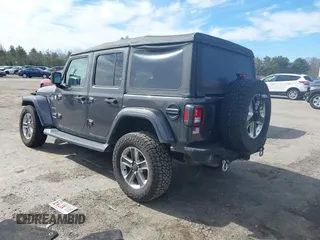 2018 Jeep Wrangler Unlimited Sahara with VIN 1C4HJXEG0JW246110, listed as a IAAI auction lot 41826662 with 65,236 mi miles. Bid and sale history available at carsss.com. Image 3.