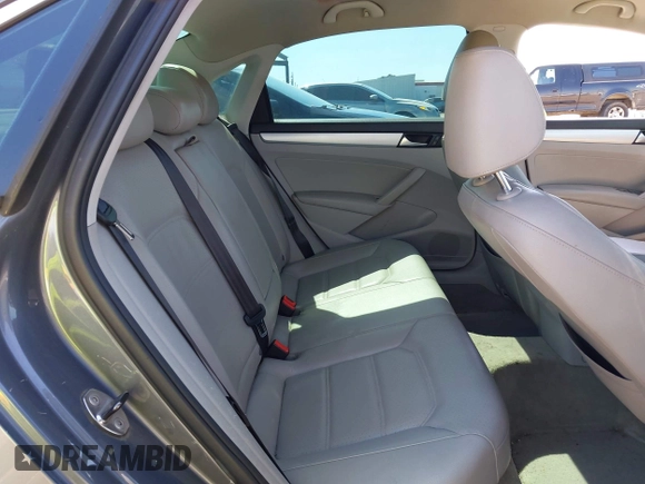 2013 Volkswagen Passat SE w/Sunroof & Nav with VIN 1VWBP7A35DC148149, listed as a IAAI auction lot 42148096 with 228,555 mi miles. Bid and sale history available at carsss.com. Image 8.
