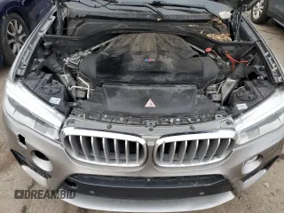 2016 BMW X5 M z VIN 5YMKT6C58G0R79357, wystawiony jako Copart lot #79043573 z przebiegiem 91 993 mil mil oraz . Historia ofert i sprzedaży dostępna na DreamBid. Obrazek 12.