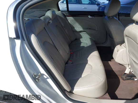 2009 Buick Lucerne CXL with VIN 1G4HD57M19U109257, listed as a IAAI auction lot 42064449 with 153,665 mi miles. Bid and sale history available at carsss.com. Image 8.