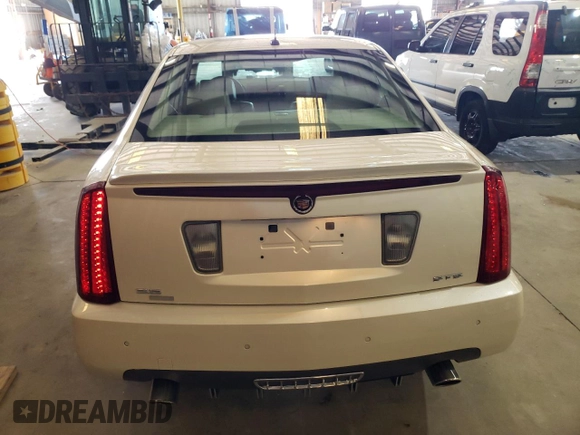 2007 Cadillac STS z VIN 1G6DW677170153246, wystawiony jako Copart lot #59531015 z przebiegiem 65 092 mil mil oraz Szkoda całkowita • Salvage title. Historia ofert i sprzedaży dostępna na DreamBid. Obrazek 6.