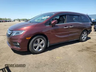 2018 Honda Odyssey EX-L z VIN 5FNRL6H73JB058562, wystawiony jako Copart lot #55846915 z przebiegiem 40 674 mil mil oraz Czysty tytuł • Clean title. Historia ofert i sprzedaży dostępna na DreamBid. Obrazek 1.