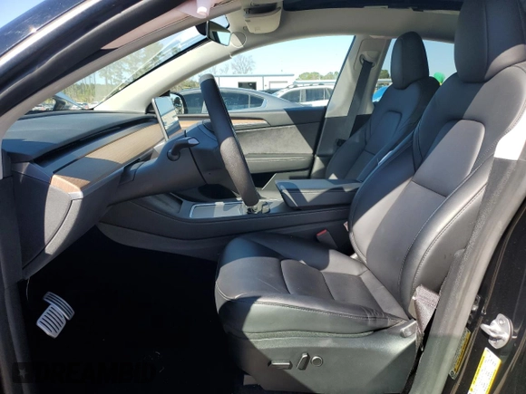 2023 Tesla Model Y Performance with VIN 7SAYGDEF2PF828973, listed as a Copart auction lot 45276585 with 15,750 mi miles and Salvage Title. Bid and sale history available at DreamBid. Image 7.