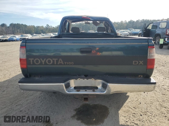 1995 Toyota T100 DX with VIN JT4VD12E1S0012010, listed as a Copart auction lot 83223154 with 253,492 mi miles and Salvage Title. Bid and sale history available at DreamBid. Image 6.