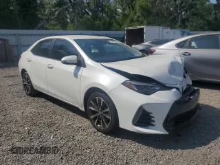 2019 Toyota Corolla L with VIN 5YFBURHE5KP921284, listed as a Copart auction lot 54277235 with 100,935 mi miles and Salvage Title. Bid and sale history available at DreamBid. Image 4.