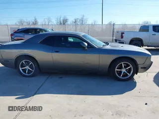 2012 Dodge Challenger SXT Plus with VIN 2C3CDYAG1CH262352, listed as a IAAI auction lot 41662002 with 141,868 mi miles. Bid and sale history available at carsss.com. Image 13.