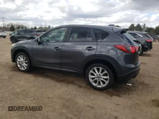 2015 Mazda CX-5 Grand Touring with VIN JM3KE4DY2F0526535, listed as a Copart auction lot 53046855 with 90,288 mi miles and Salvage Title. Bid and sale history available at DreamBid. Image 2.