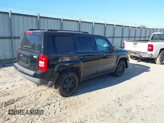 2014 Jeep Patriot Altitude with VIN 1C4NJPBA7ED534498, listed as a IAAI auction lot 40634890 with 115,330 mi miles and . Bid and sale history available at DreamBid. Image 4.
