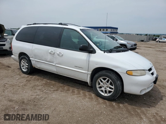 2000 Dodge Caravan SE with VIN 1B4GP44G7YB636078, listed as a Copart auction lot 59387395 with 184,916 mi miles and Salvage title. Bid and sale history available at DreamBid. Image 4.