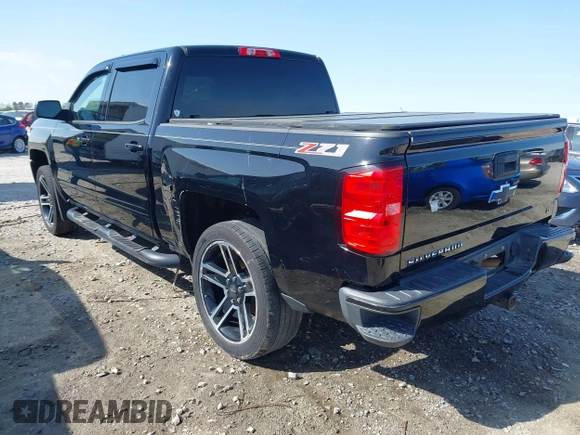 2017 Chevrolet Silverado 1500 LT with VIN 3GCUKREC4HG310842, listed as a IAAI auction lot 41908001 with 179,814 mi miles and . Bid and sale history available at DreamBid. Image 3.