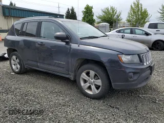 2016 Jeep Compass Sport with VIN 1C4NJDBB3GD520141, listed as a Copart auction lot 56902885 with 147,154 mi miles and Salvage title. Bid and sale history available at DreamBid. Image 4.