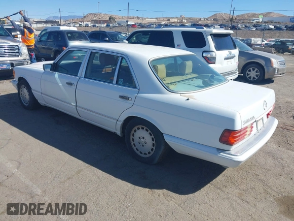 1989 Mercedes-Benz 560 with VIN WDBCA39DXKA433631, listed as a IAAI auction lot 41687132 with 137,621 mi miles and . Bid and sale history available at DreamBid. Image 3.