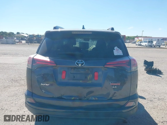 2018 Toyota RAV4 LE with VIN JTMZFREV7JJ207270, listed as a IAAI auction lot 41853828 with 89,179 mi miles. Bid and sale history available at carsss.com. Image 17.