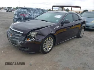 2010 Cadillac CTS Premium with VIN 1G6DP5EV4A0116188, listed as a IAAI auction lot 42808158 with 125,359 mi miles and . Bid and sale history available at DreamBid. Image 2.