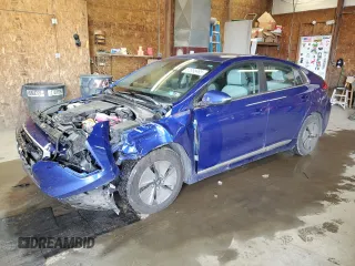 2022 Hyundai Ioniq SE z VIN KMHC75LCXNU275527, wystawiony jako Copart lot #57398495 z przebiegiem 90 729 mil mil oraz Szkoda całkowita • Salvage title. Historia ofert i sprzedaży dostępna na DreamBid. Obrazek 1.