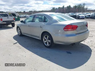 2013 Volkswagen Passat SE w/Sunroof & Nav with VIN 1VWBP7A37DC125598, listed as a IAAI auction lot 42022573 with 149,812 mi miles. Bid and sale history available at carsss.com. Image 3.