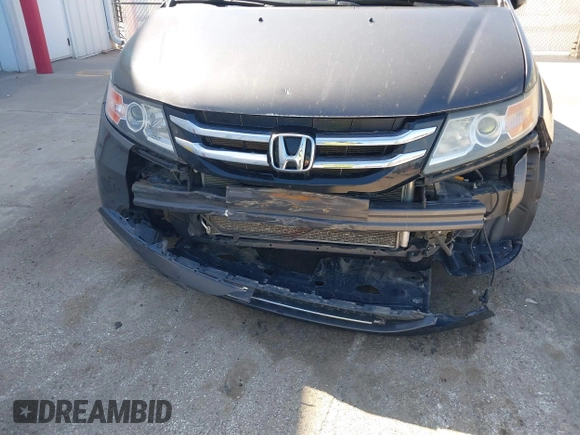2014 Honda Odyssey Touring with VIN 5FNRL5H97EB101169, listed as a IAAI auction lot 41869233 with 142,147 mi miles and . Bid and sale history available at DreamBid. Image 6.
