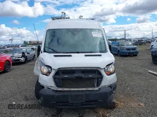 2022 Ford Transit Cargo with VIN 1FTBR1C83NKA78404, listed as a IAAI auction lot 40335158 with 31,273 mi miles and . Bid and sale history available at DreamBid. Image 12.