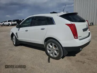 2014 Cadillac SRX Premium Collection z VIN 3GYFNGE32ES573872, wystawiony jako Copart lot #49871955 z przebiegiem 119 362 mil mil oraz Szkody całkowita. Historia ofert i sprzedaży dostępna na DreamBid. Obrazek 2.